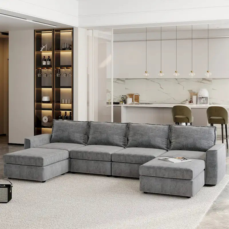 Divano componibile a U trasformabile a 6 posti grigio 115 con pouf, tessuto personalizzabile e braccioli reclinabili